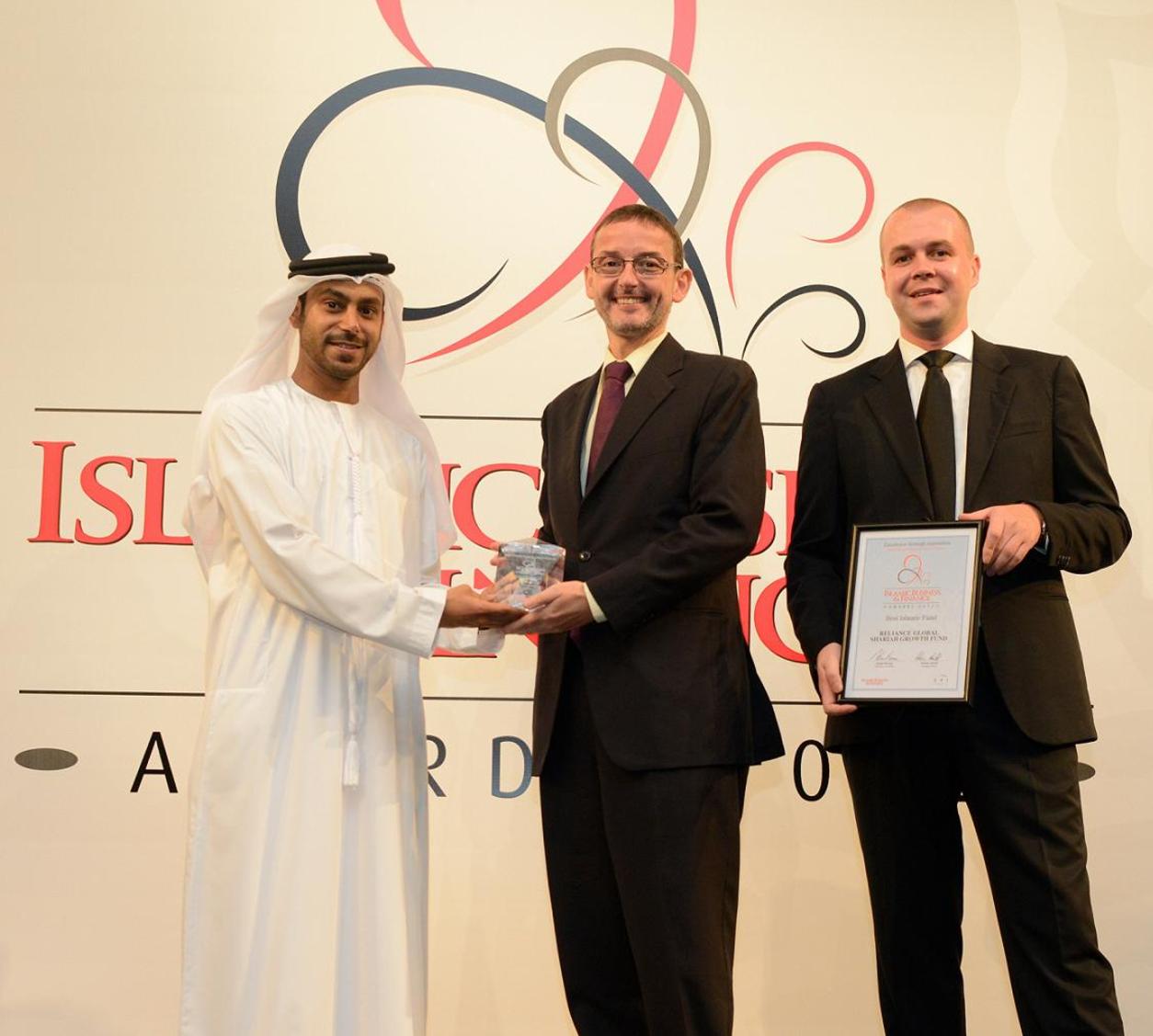 Cogent Asset Management team receiving the Islamic Business & Finance Award